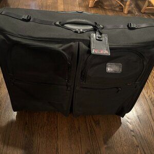 TUMI Garment 4 Wheeled Carry On- Black Used Once